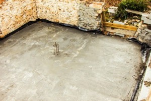Concrete floor with damp proofing & insulation.